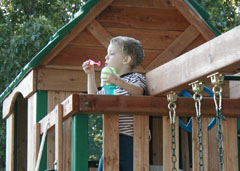 Enjoying A Nice Evening With His Swingset & Bubble